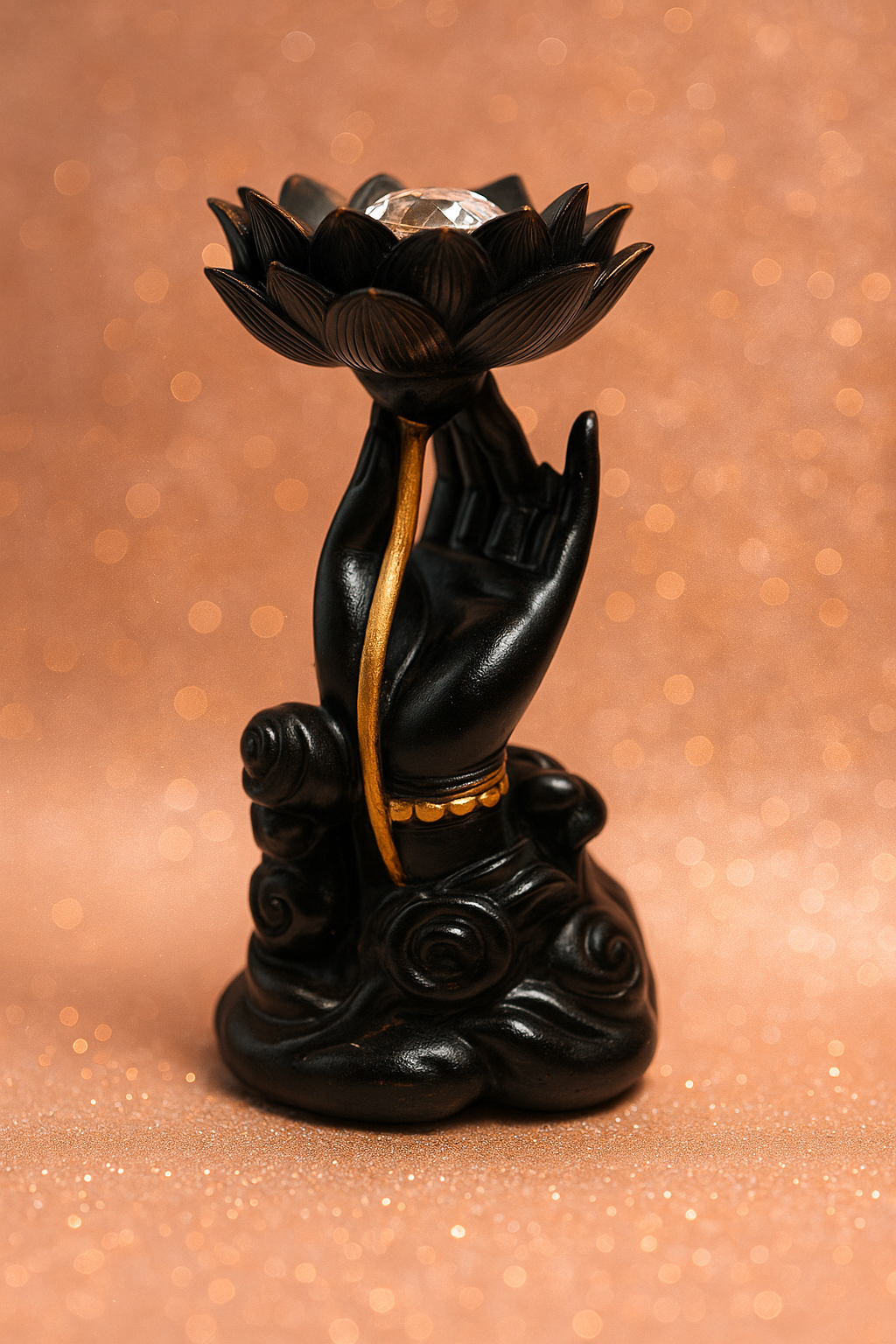 Black and gold resin hand holder